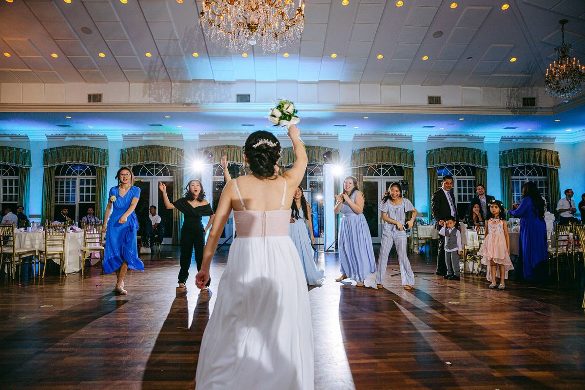 The bouquet toss at Andrew's wedding