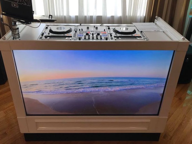 Video screen DJ booth showing custom content on its built-in screen