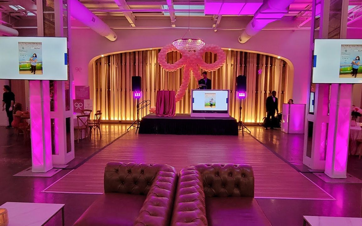 Pink ATG uplighting all around the ballroom for Madelyn's Fund Pink Bow Gala at The Ruth