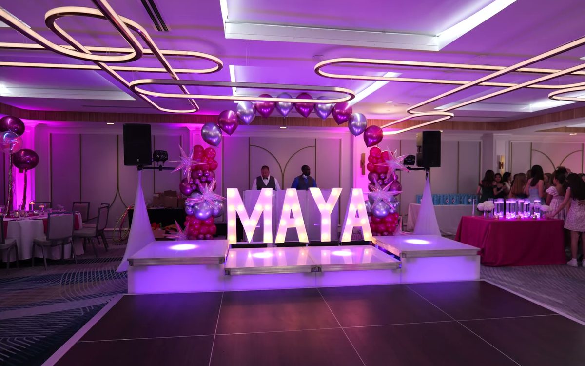 MAYA marquee on ATG's lit LED dance boxes under purple uplighting at Renaissance Charlotte SouthPark