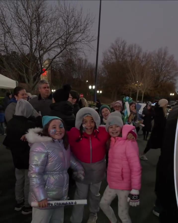 Kids at the community Chanukah menorah lighting