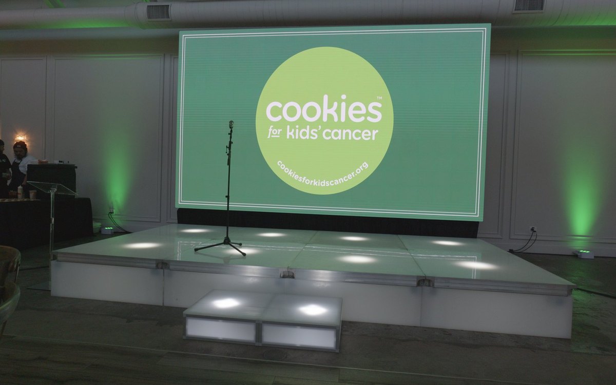 Cookies for Kids' Cancer on the ATG video wall above the LED stage at The Casey