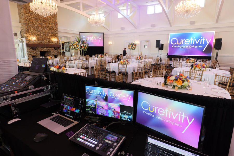 ATG AV desk running screens and sound at a Charlotte gala