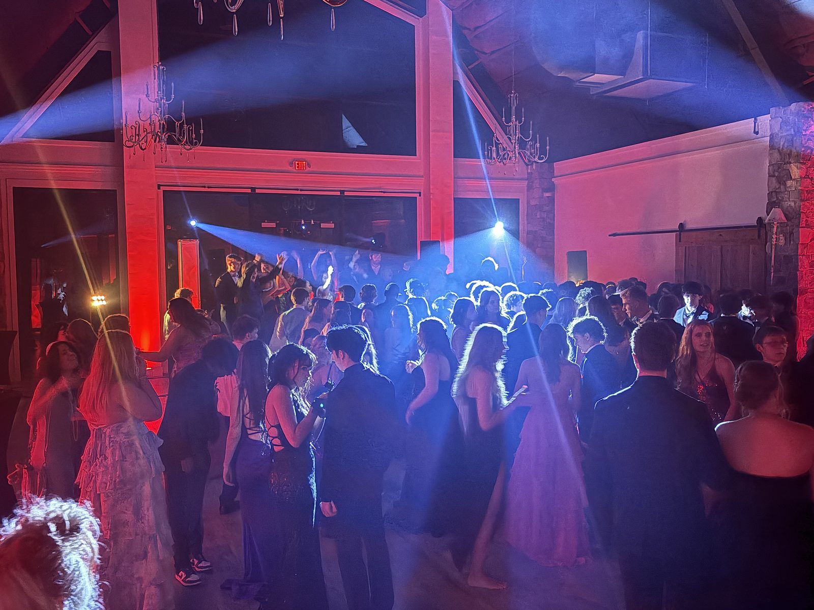Beam lights over a packed dance floor at DuGaren