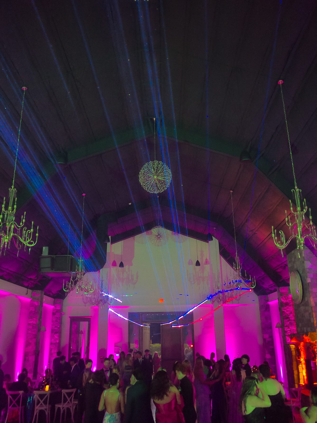 Lasers and uplighting over the prom dance floor at DuGaren Venues & Vineyards